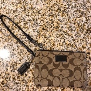Coach Signature zip clutch bag